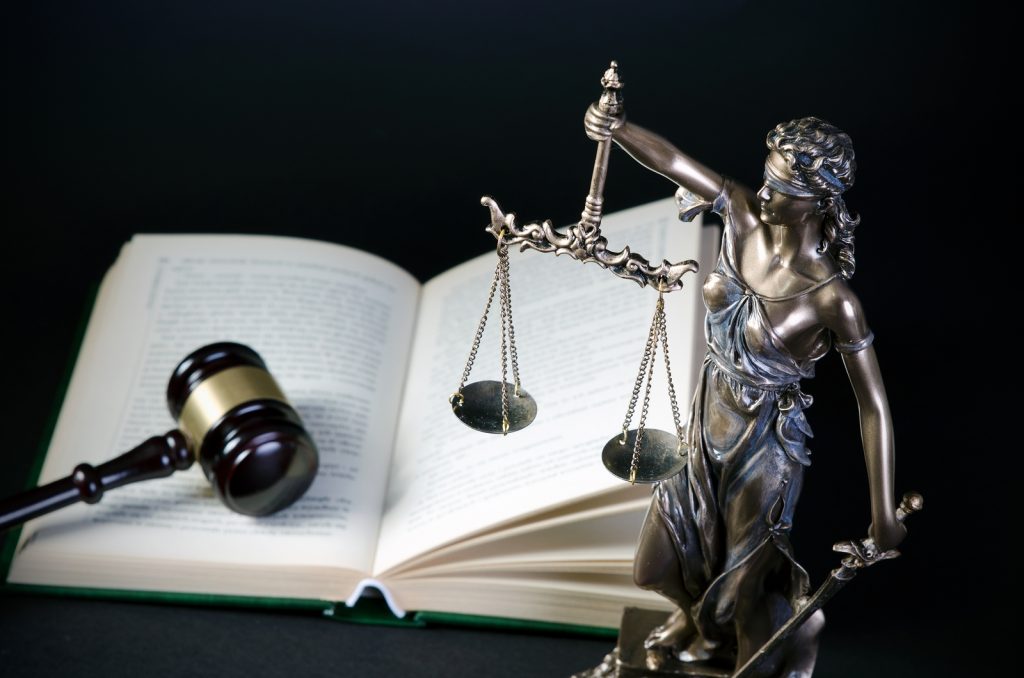 Maine family law case and a PFA order with gavel and scales of justice